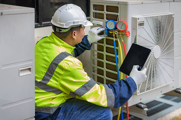 Professional Hvac Maintenance technician working in Highland, IL